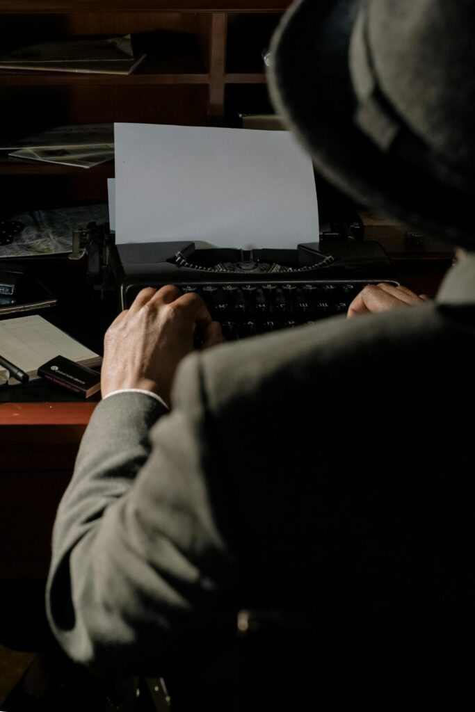 Cinematic scene of a detective typing on a vintage typewriter in dim light.